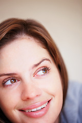 Image showing Woman, thinking and smile or closeup happy weekend rest, lazy holiday nap or calm peace. Female person, relax and thoughts for wellness cozy or comfort idea on vacation, morning break in apartment