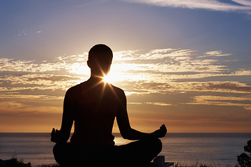 Image showing Person, meditation and yoga in beach sunset for zen fitness, calm exercise and mindfulness or holistic wellness in silhouette. Back and nature with lotus hands, outdoor peace and mental health by sea