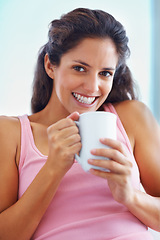 Image showing Portrait, smile and woman drinking coffee in home, espresso or latte for breakfast to relax in living room in the morning. Face, tea cup and happy person or girl with healthy beverage in apartment