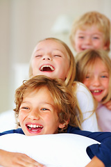 Image showing Portrait, love or funny with brother and sister sibling children on a bed in their home together. Family, happy or laughing with young boy and girl kids in the bedroom of an apartment on the weekend