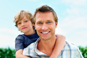 Image showing Father, son and portrait outdoor with piggyback for bonding, relationship and freedom with blue sky or happy. Family, man and boy child in nature with care and love for excitement, peace and support