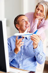 Image showing Travel, senior or happy couple on computer for booking an airplane trip online together in home. Aeroplane, planning holiday vacation or mature people on a website, internet or network in retirement