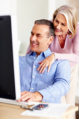 Image showing Financial, hug or mature couple with computer in home for retirement savings or pension budget. Planning, finance news or senior man talking to happy woman for house bills, profit growth or research