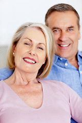 Image showing Senior, couple and portrait or happy on sofa with support, relationship and marriage in retirement home. Elderly, man and woman with smile on couch in living room with trust, care and love in house