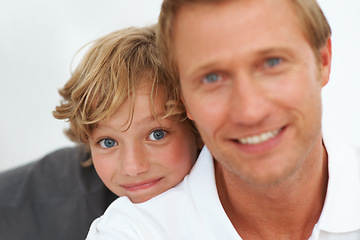 Image showing Portrait, face and child smile with dad for love, care and bonding together in studio isolated on white background. Fathers day, young boy kid and happy for childhood development, support or relaxing