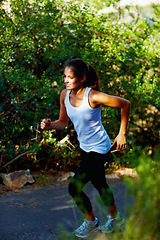 Image showing Running, health and fitness with woman in nature for summer, speed and cardio challenge. Wellness, sports and workout with female runner training in outdoor path for exercise, fast and performance