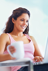 Image showing Woman, smile and coffee with laptop with reading digital blog and relax wellness in chair in home. Young person, happy and computer with espresso for online subscription and technology in apartment