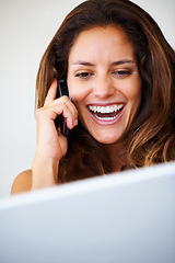 Image showing Laptop, phone call and young woman laughing at comic, funny or comedy joke in conversation at home. Smile, technology and person from Canada on mobile discussion with cellphone at modern house.