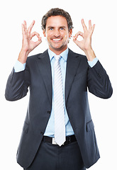 Image showing Businessman, ok and smile in portrait, promotion and agreement or approval by white background. Male person, face and emoji or icon, yes and like or success, satisfaction and good job or well done