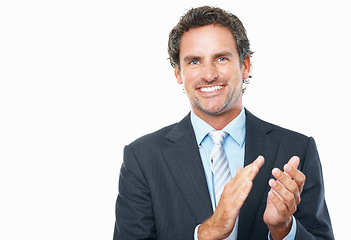 Image showing Business man, portrait and applause in studio for success, praise or congratulations to winner on white background. Happy mature entrepreneur clapping hands to celebrate winning award at mockup space