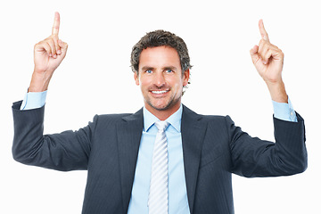 Image showing Business man, portrait and pointing in studio for advertising deal, promotion and information on white background. Happy mature entrepreneur show presentation of feedback, offer and news announcement