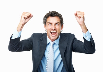 Image showing Excited business man, portrait or fist for success, celebrate deal or winning promotion in studio on white background. Happy mature entrepreneur, giveaway prize winner or reward for bonus achievement