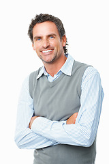Image showing Smile, crossed arms and mature businessman in studio with positive, good and confident attitude. Happy, portrait and professional male person from Australia with career isolated by white background.