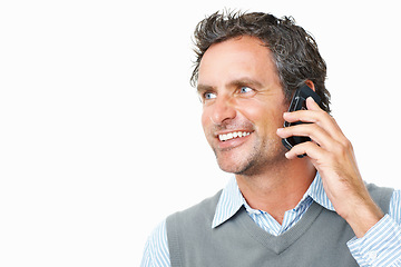 Image showing Smile, phone call and mature businessman in studio for corporate communication or discussion. Happy, technology and professional male person on mobile conversation with cellphone by white background.