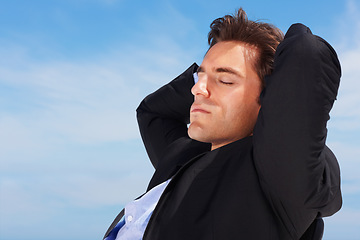 Image showing Business man, relax and sleep outdoor with corporate professional in a chair with peace and calm. Worker, male employee and suit with mockup space and blue sky with job and career with nap and break