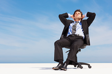 Image showing Business man, relax and outdoor sleep of a corporate professional in a chair with peace from calm. Worker, male employee and suit with mockup space and blue sky with job and career with nap sitting