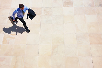 Image showing Running, delay and a business man rushing to work for an appointment with a briefcase from above. Panic, fast and late with a professional employee in a hurry to get to his destination in the city