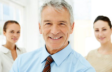 Image showing Portrait, business and leadership with a senior man in the office as a CEO, manager or boss of a company. Face, smile and management with a happy mature leader in the workplace for a corporate job