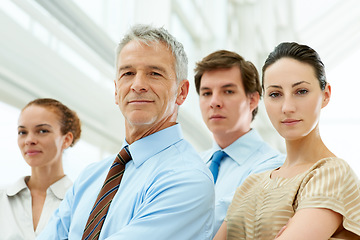 Image showing Portrait, leadership and arms crossed with a senior man in the office as a CEO, manager or boss of a company. Face, management with a confident mature leader in the workplace for a corporate job