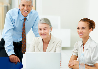 Image showing Portrait, happy team and ceo on laptop in business meeting together, collaboration or cooperation. Senior face, group and professional financial consultants on computer, manager and people in office