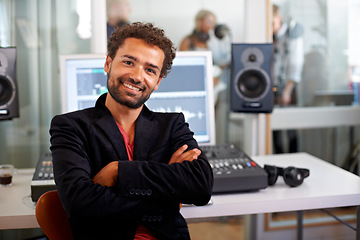 Image showing DJ, arms crossed and recording studio portrait with a man and music producer with tech and computer. Sound engineer, audio technician and media with a professional in industry with synthesizer