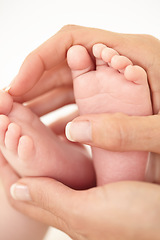 Image showing Woman, child and feet closeup for holding love or childhood bonding, motherhood or newborn. Female person, infant and toes or care support for kid growth development, parent trust or nurture youth