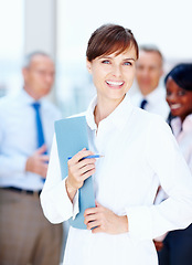 Image showing Meeting, documents and portrait of business woman with team for collaboration, leadership and management. Corporate worker, company and face of manager for professional career, job and work in office