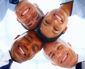 Image showing Portrait, businesspeople and huddle with low angle in office with closeup for diversity, trust and support with circle. Corporate, team and together with smile for unity, solidarity and inclusion