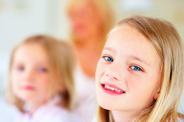 Image showing Happy, smile and portrait of sibling girls in home for bonding, love and cute relationship. Family, childhood sisters and face of young kids for playing, fun and relaxing in living room together