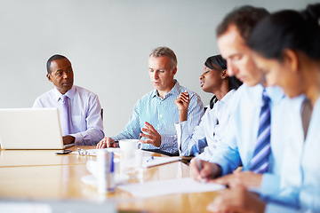 Image showing Teamwork, business people and meeting with a laptop, brainstorming and cooperation with ideas, planning and project. Group, manager and employees with a pc, support and solidarity with diversity