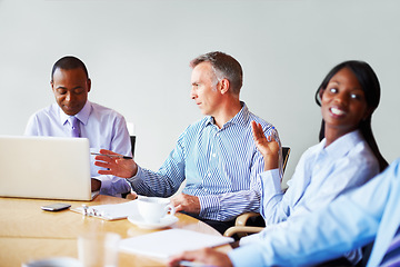 Image showing Business people, teamwork and laptop with ideas, planning and conversation with collaboration, website and cooperation. Group, meeting and man with women, diversity and pc with support and project