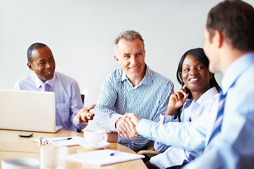 Image showing Business people, shaking hands and partnership with meeting success, b2b deal and onboarding or thank you. Professional manager, clients or mature boss with handshake in team agreement or negotiation