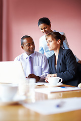 Image showing Business people, partnership and laptop with brainstorming, ideas and planning with collaboration, company website and cooperation. Group, meeting and man with women, office and pc with teamwork