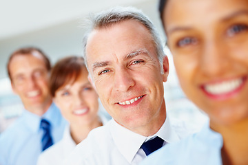 Image showing Smile, portrait of senior businessman with team in office for positive, good and confident attitude. Happy, collaboration and professional elderly male manager from Canada with people in workplace.