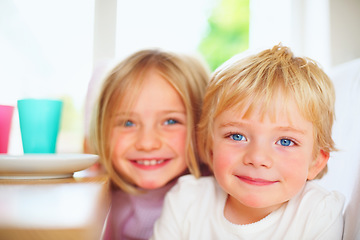 Image showing Kids, breakfast and portrait at home in the morning with food, smile and happy from eating. Family, dinner table and hungry young child with meal for health and nutrition in a house with sibling