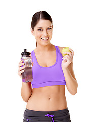 Image showing Woman, apple and water bottle in studio for healthy food choice, wellness and diet on a white background. Portrait of young model or vegan person with green fruit and liquid for detox or weight loss