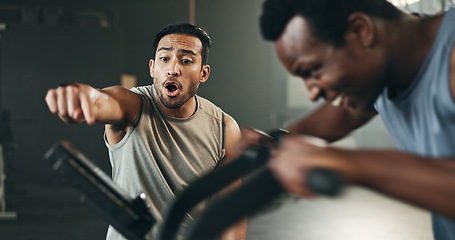Image showing Trainer, support and man on fitness bike, motivation and cardio at gym, workout and exercise. Instructor, coach and bicycle at health club, equipment and performance or challenge, training or cycling