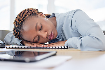 Image showing African woman, tired and sleeping on office table with rest, burnout and nap for overtime, project and documentation. Employee, person and eyes closed for exhausted, fatigue and dream in workplace