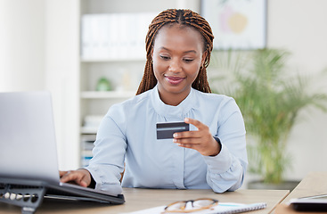 Image showing African woman, credit card and laptop in office with typing, click and easy payment with online shopping. Employee, person or girl with banking, computer and e commerce with finance, choice or budget