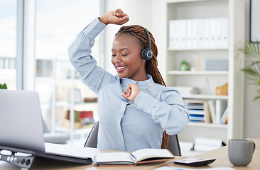 Image showing Woman, laptop and headphones for dancing in office, smile and happy with audio streaming subscription. Dancer girl, employee and black person with computer, listening and music on web in workplace