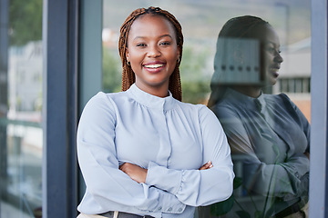 Image showing Happy, crossed arms and professional black woman at office with positive, good and confident attitude. Smile, smart and portrait of young African female attorney with law career at workplace.