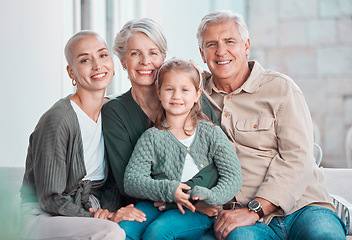 Image showing Grandparents, girl and mother in portrait on sofa with hug, care or bonding with love in family home lounge. Elderly people, kid and mom with smile, relax and together on living room couch in house