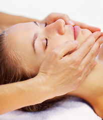 Image showing Woman, relax and face massage with spa therapist for wellness, holistic therapy and reiki in studio on white background. Beauty, skincare and or client rest for facial acupressure, treatment or peace