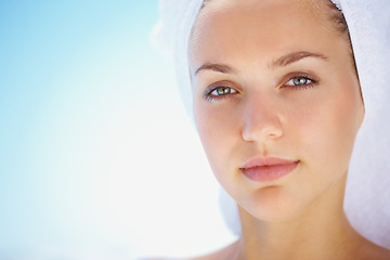 Image showing Skincare, beauty and portrait of woman in studio for wellness, cosmetics or treatment on blue background. Mockup, face and calm lady model with dermatology, shine or glowing skin results after shower