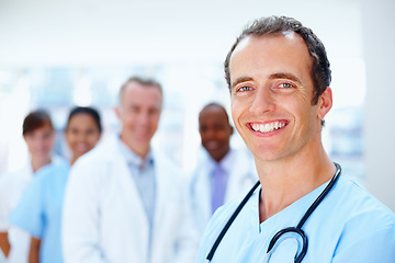 Image showing Doctors, man and team portrait in clinic with staff, leadership or together for healthcare services. Medic, group and solidarity with diversity for inclusion, women or nurses with support in hospital