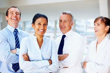 Image showing Happy business people, portrait and laughing with arms crossed in confidence, leadership or management at office. Group of funny executive or corporate professionals smile in teamwork at workplace