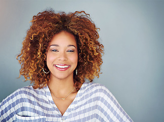 Image showing Portrait, smile and creative business woman isolated on a gray background mockup space. Face, happy professional designer or entrepreneur, young employee and person working at startup in South Africa