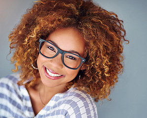 Image showing Portrait, smile and business woman in glasses isolated on a gray background. Face, happy professional in spectacles and young creative designer, entrepreneur and employee working at startup in Brazil