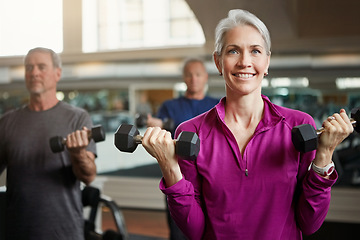 Image showing Senior fitness, club and people with dumbbells at gym for training, health and wellness, sport or exercise. Class, workout and elderly group of friends at a studio for bodybuilding or weightlifting