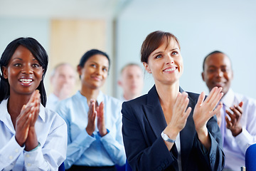 Image showing Businesspeople, success and applause for presentation at seminar, trade show or conference in New York. Diverse group, staff or crowd with smile, happy or clapping in excitement for speaker for pride